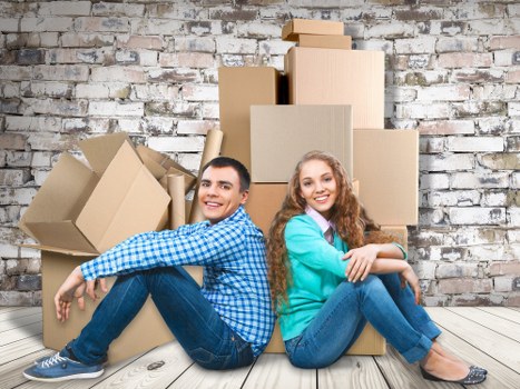 Professional movers handling boxes and furniture in Kentish Town