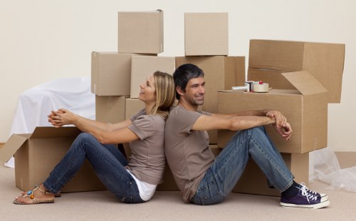 Moving team loading boxes and furniture for a local Kentish Town move