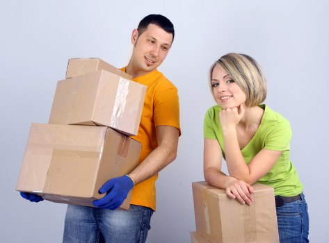 Professional movers loading items during house removals in Kentishtown