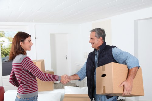 Moving team loading furniture and boxes for a local house removal