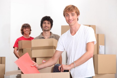 Packed moving boxes ready for flat removals in Kentishtown