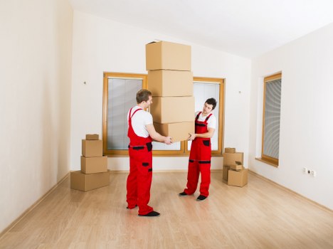 Family settling into a new home after house removals in Kentishtown